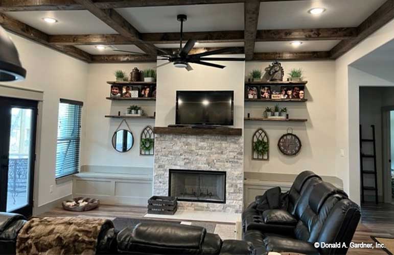 Great room with coffered ceiling, wood beams. Janet plan 1513