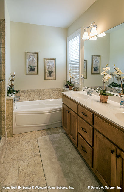 Double sink vanity with tub off to the side in the bathroom. The Jarrell plan 1017.