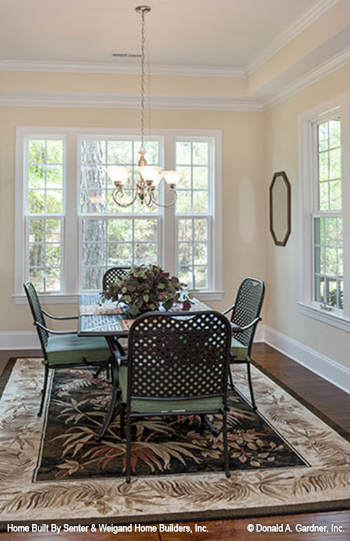 Well-lit dining room with tray ceiling. The Jarrell plan 1017.