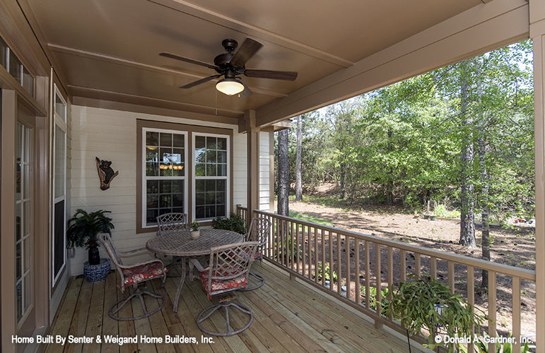 Second view of covered rear porch with banister. The Jarrell plan 1017.