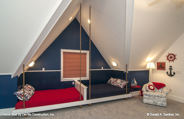 Nautical theme double beds in the secondary bedroom. The Jasper Hill plan 5020.