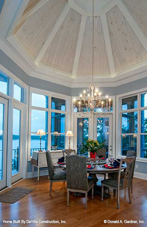 Floor to ceiling windows in the dining room.The Jasper Hill plan 5020.