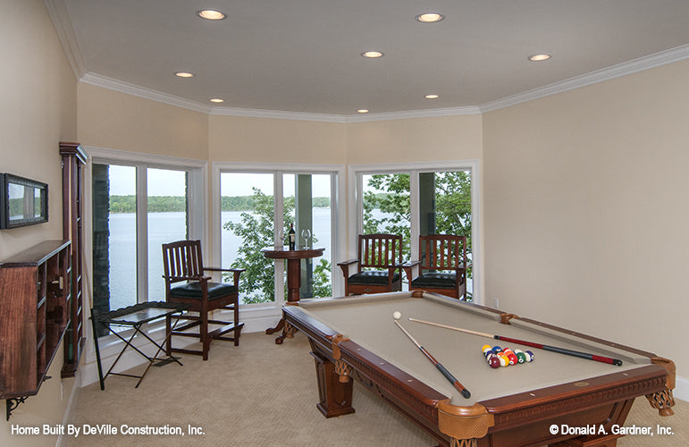 Large windows and pool table in the rec room. The Jasper Hill plan 5020.