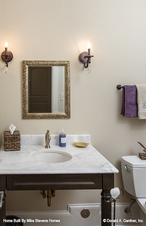 This is a photograph of a bathroom of three bedroom house plan 1185 The Jenner as built by a customer