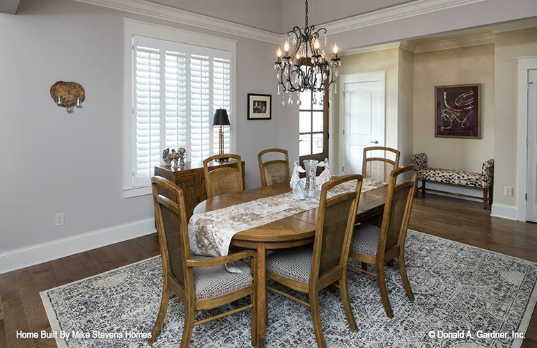 This is a photograph of the dining room  of three bedroom house plan 1185 The Jenner as built by a customer