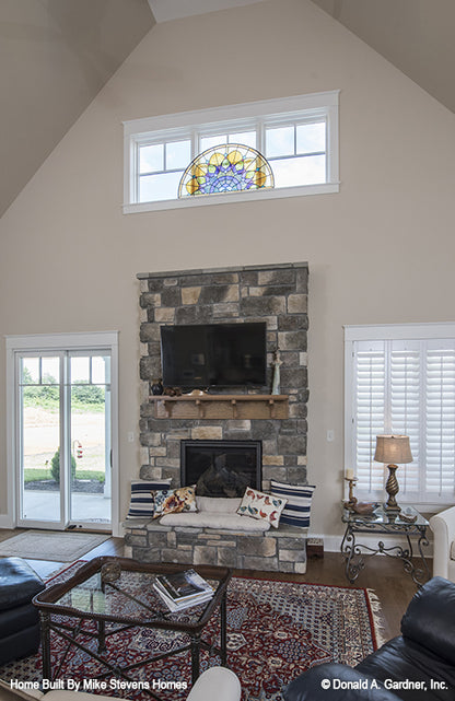 This is a photograph of the great room fireplace of three bedroom house plan 1185 The Jenner as built by a customer