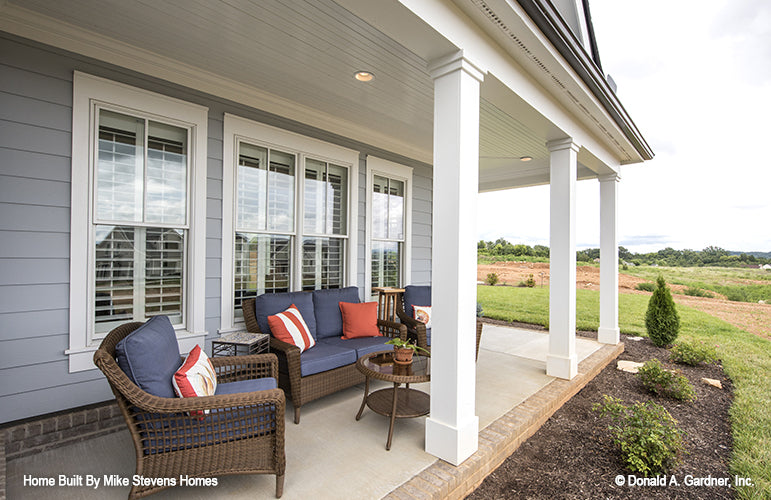 This is a photograph of the porch on rear of three bedroom house plan 1185 The Jenner as built by a customer