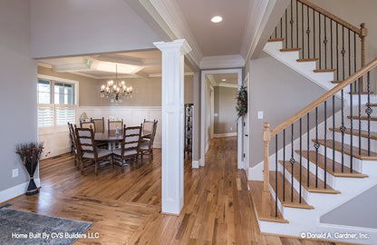 Dining room and stairs picture of luxury house plan 1033 The Jerivale