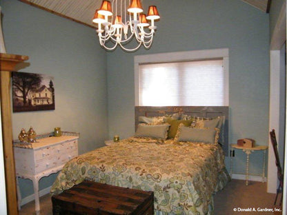 This is a bedroom picture of the front of small house plan 1189 The Kellswater