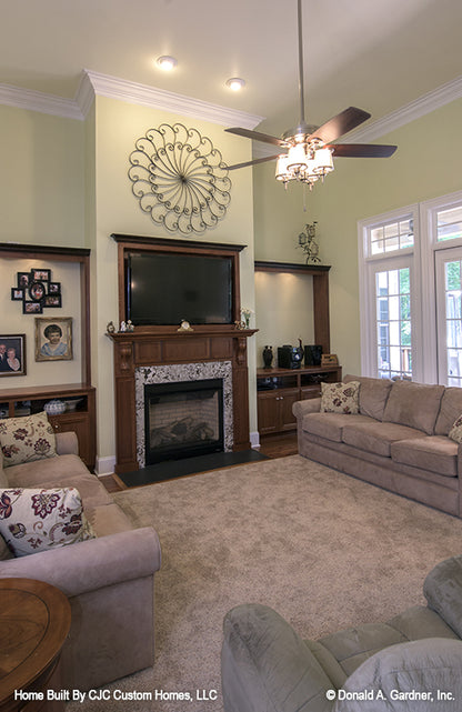 This is a picture of the great room fireplace of luxury house plan 1166 The Kenningstone