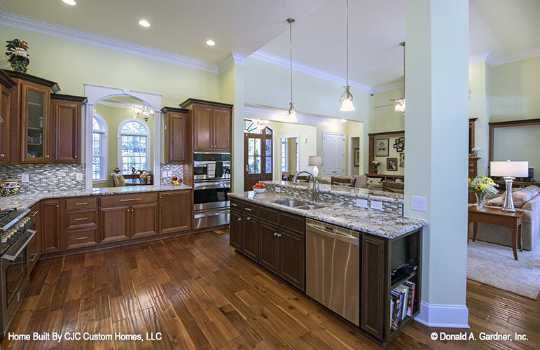 This is an open floorplan kitchen picture of luxury house plan 1166 The Kenningstone