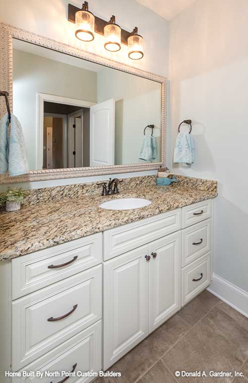 Single sink vanity in the bathroom. The Landry plan 1291.