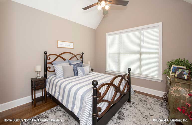 Ceiling fan and triple window in the secondary bedroom. The Landry plan 1291.