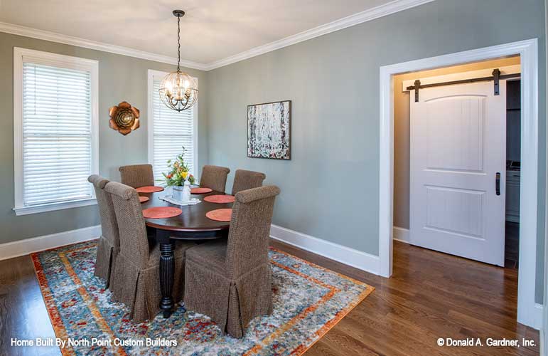 Crown molding around the ceiling and windows in the dining room. The Landry plan 1291.