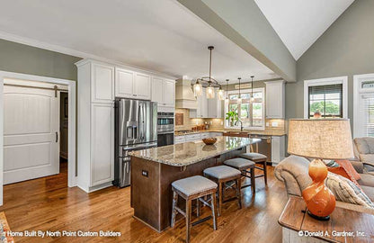 Island seating in the kitchen. The Landry plan 1291.