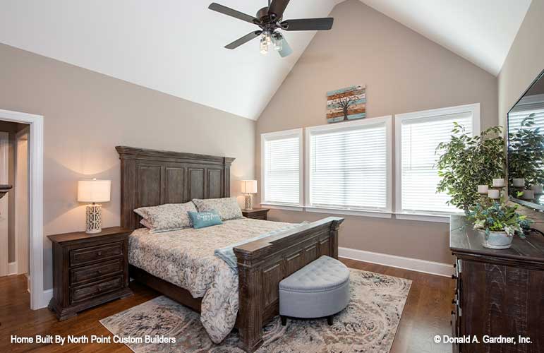 Vaulted ceiling and ceiling fan in the master bedroom. The Landry plan 1291.