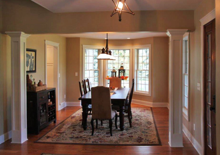 Six person table in the dining room. The Larson plan 1629.