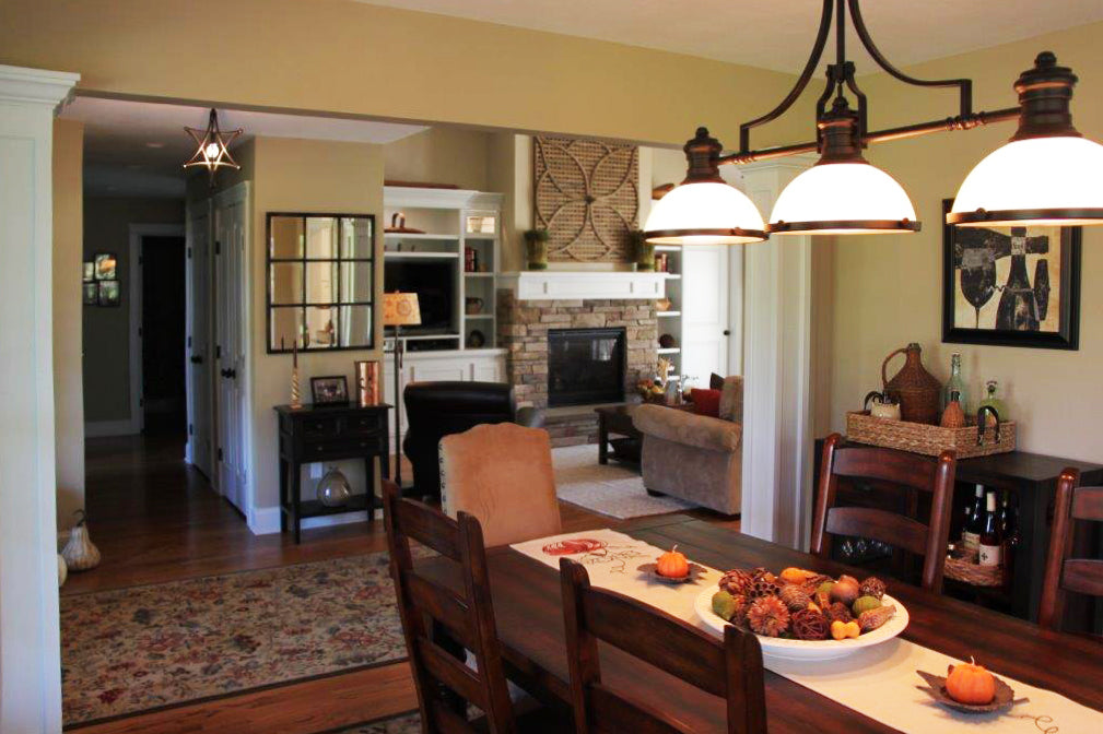 View into the great room from the dining room. The Larson plan 1629.