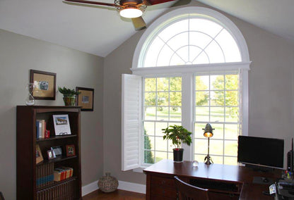 Half moon window in the study. The Larson plan 1629.