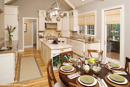 Full view of the kitchen with white cabinets. The Laurelwood plan 5024.