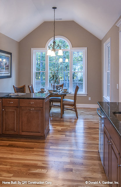 Vaulted ceiling and arched window in the breakfast room. The Lennon plan 1300