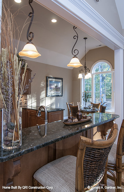 Kitchen bar view with recessed lighting in the kitchen. The Lennon plan 1300