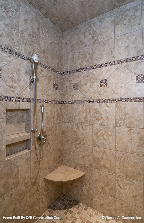 Tiled walk-in shower in the master bathroom. The Lennon plan 1300