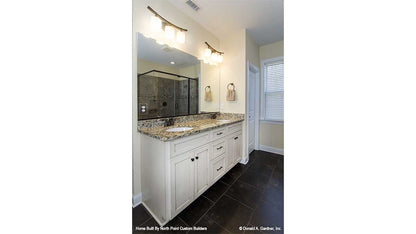 Double sink vanity in the bathroom. The Lisenby plan #1220.