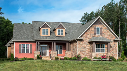 Photographs submitted by the customer. Front view ranch home. The Lisenby plan #1220.