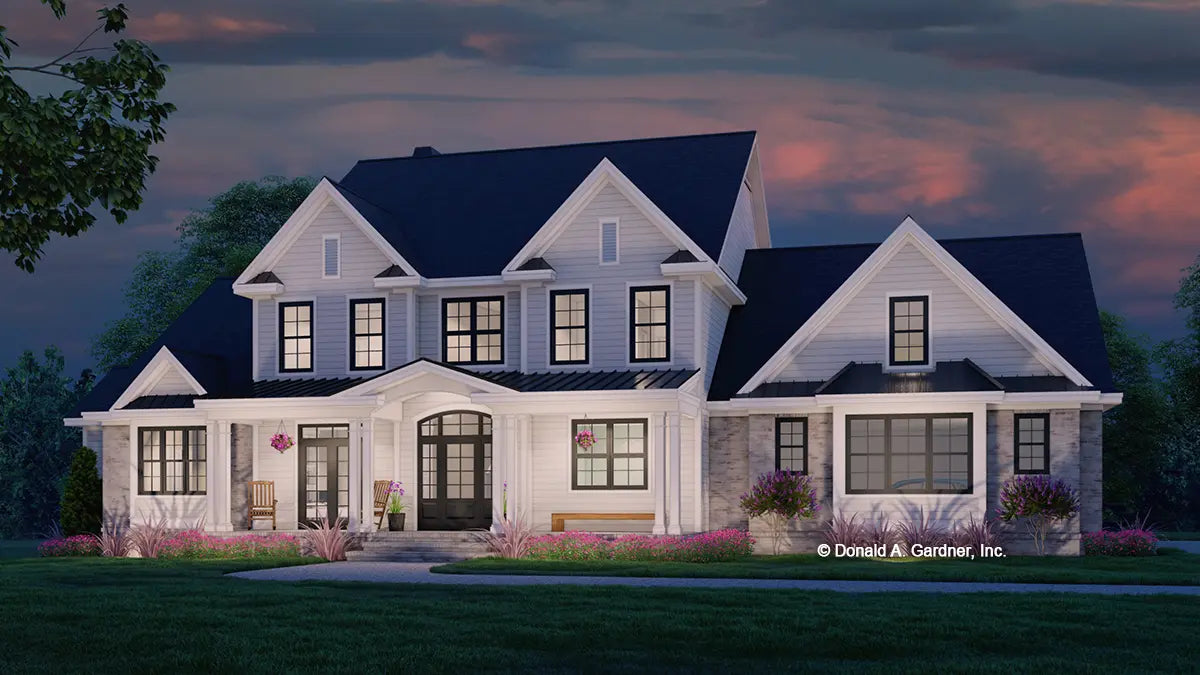 This is an illustration of the front of 5 bedroom house plan 6005 The Lorenzo at dusk