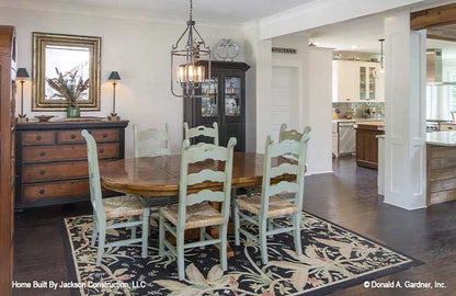 Elegant dining room open to the kitchen.  Lucinda plan 1514