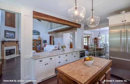 Kitchen island looking into the dining room off to the side.  Lucinda plan 1514