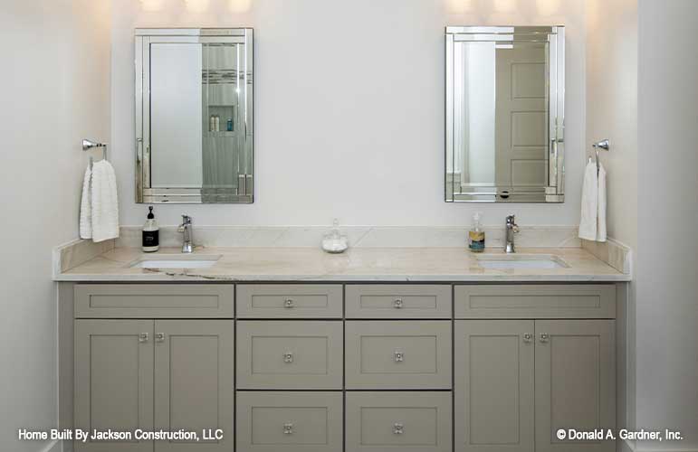 Double sink vanity with separate mirrors in the master bathroom.  Lucinda plan 1514