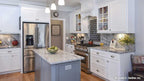 Island view, beautiful stainless-steel appliances and marble counter tops. The Lucy plan 1415