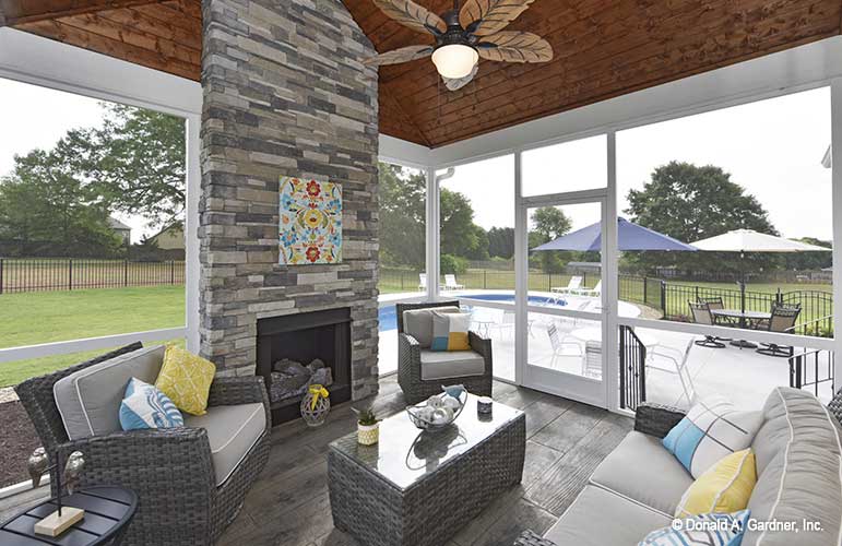 The perfect entertainment spot with this screen in reach porch, fireplace and pool view. The Lucy plan 1415