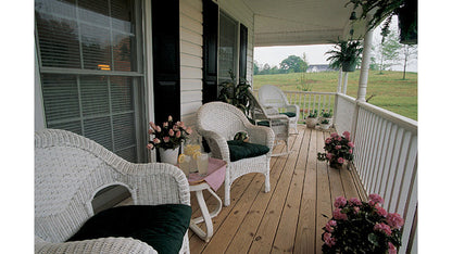 Wicker chairs on the front porch. The MacLeish plan 304.