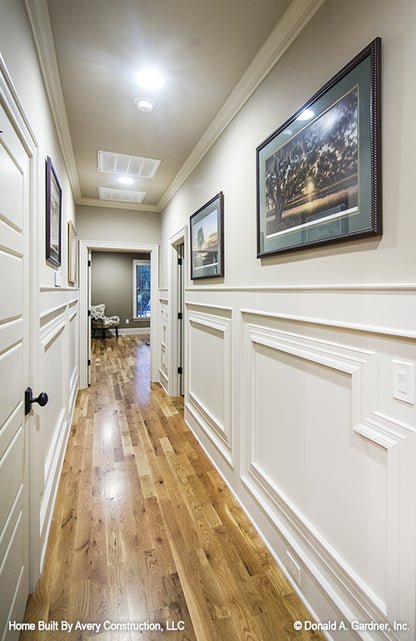 Crown molding trim in the hallway. The MacAllaster plan 838. 