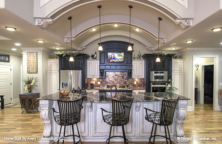 Island seating in the kitchen. The MacAllaster plan 838. 