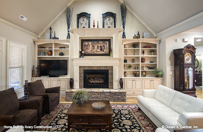 Fireplace and mantel in the living room. The MacAllaster plan 838. 