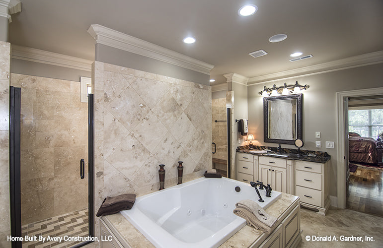 Two entry doors to the walk- in shower in the master bathroom. The MacAllaster plan 838. 