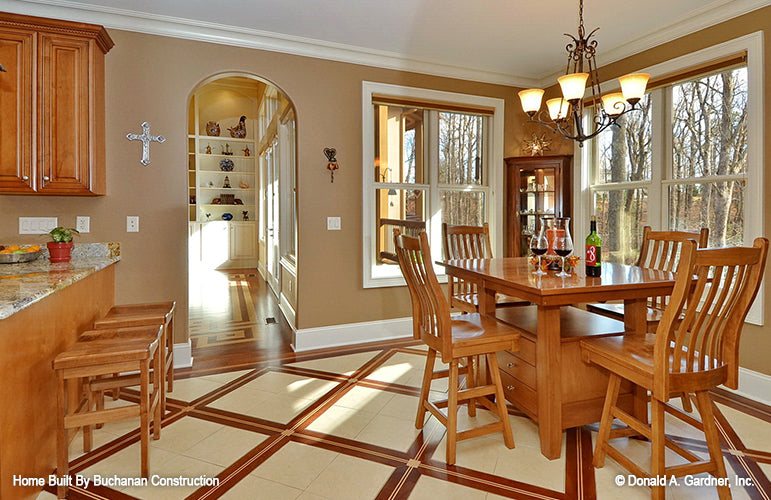 This is a photograph of the breakfast room of rustic house plan 1173 The Marcourt as built by a customer