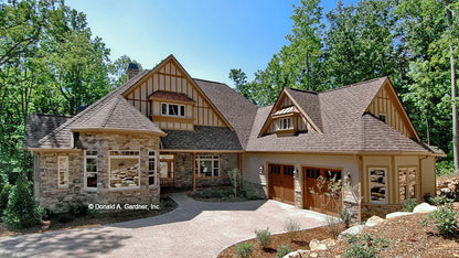 This is a photograph of the front of rustic house plan 1173 The Marcourt as built by a customer