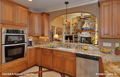 This is a photograph of the kitchen of rustic house plan 1173 The Marcourt as built by a customer