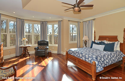 This is a photograph of the master bedroom of rustic house plan 1173 The Marcourt as built by a customer