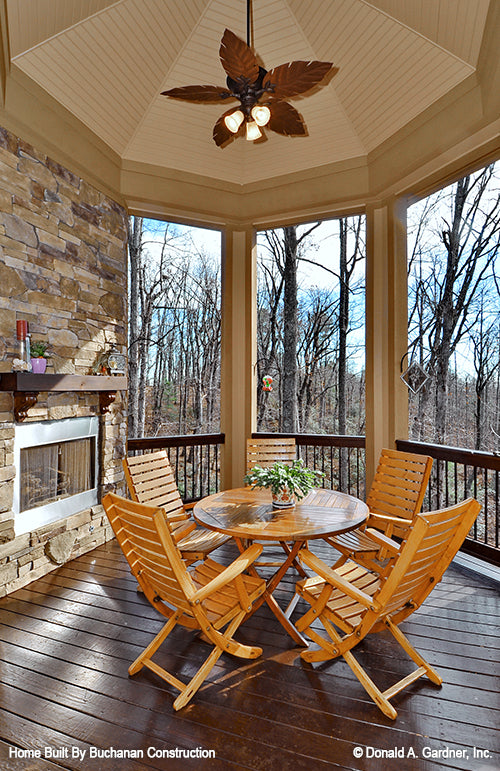 This is a photograph of the screened porch of rustic house plan 1173 The Marcourt as built by a customer