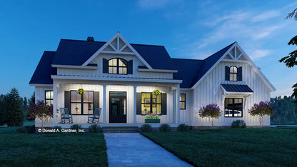 This is an illustration of the front of three bedroom house plan 1597 The Marisa at dusk