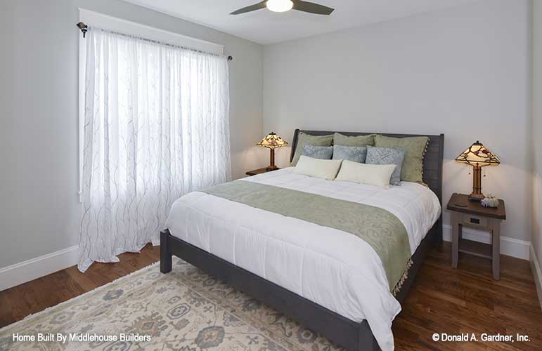 Flat ceiling and ceiling fan in the bedroom. The Mayfair plan 1317.