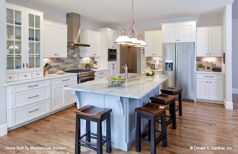 White cabinets in the kitchen. The Mayfair plan 1317.