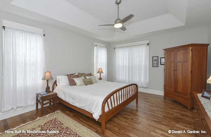 Tray ceiling and ceiling fan in the master bedroom. The Mayfair plan 1317.