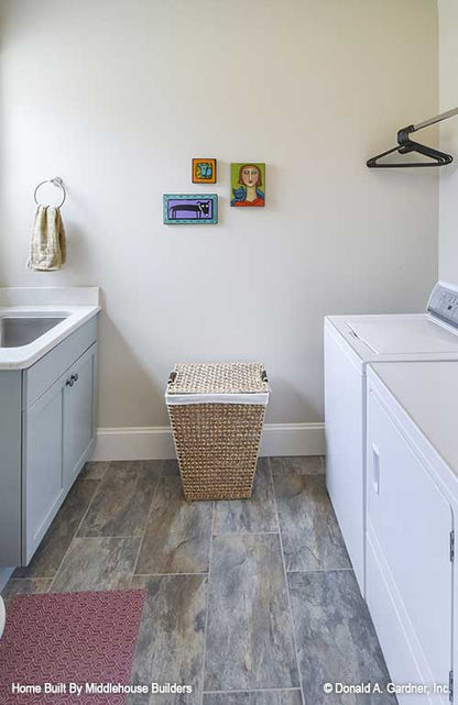 Sink, washer and dryer in the utility room. The Mayfair plan 1317.